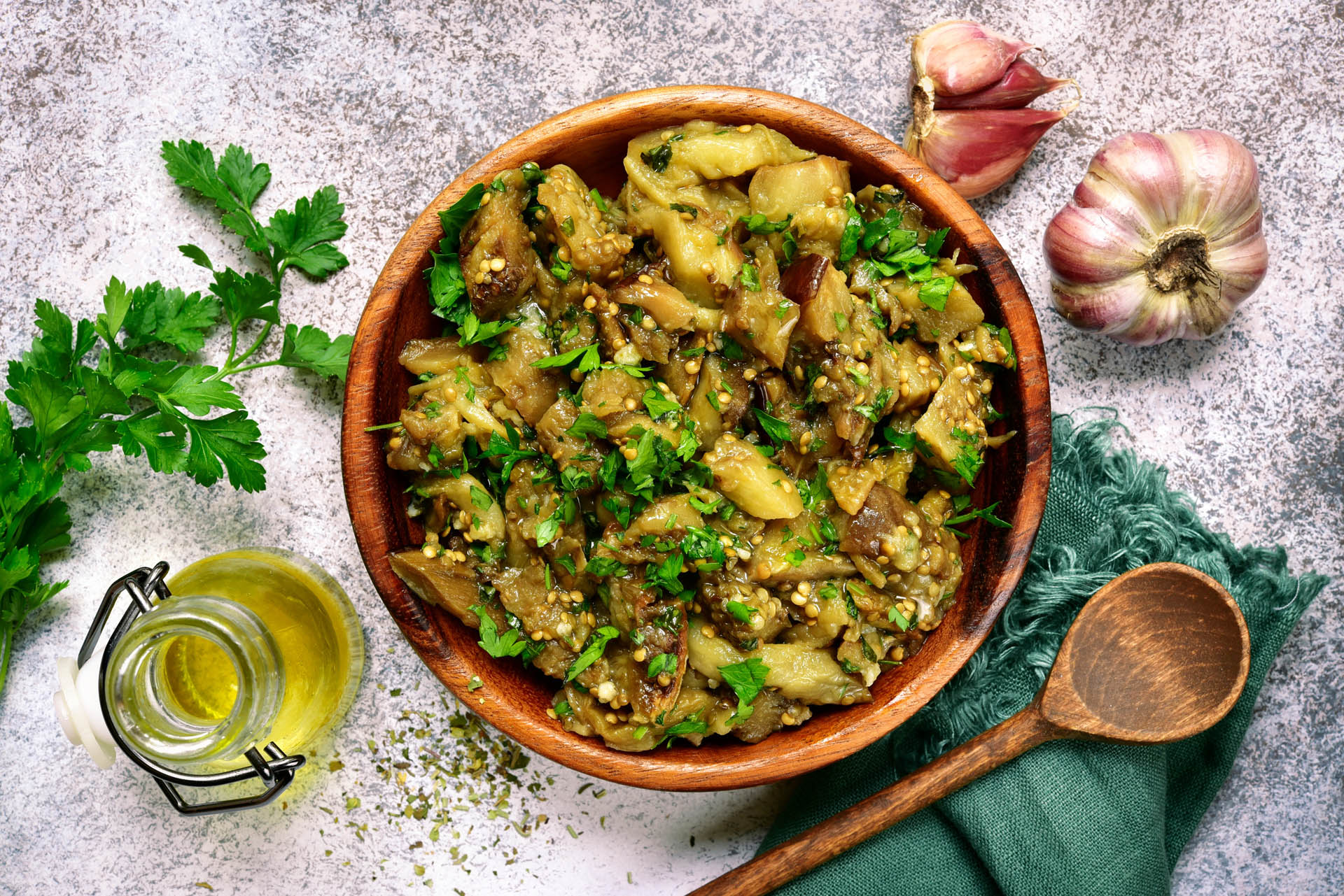 Grilled eggplant salad with parsley, garlic and olive oil.Top vi